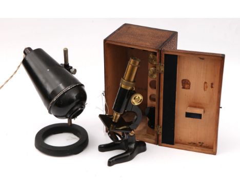A Small Compound Microscope &amp; A Swift Microscope Lamp, the microscope c. 1930, probably Italian by Koristka,  with  micro