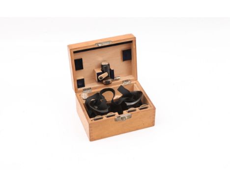 Carl Zeiss Surgeon's Headband Binoculars,  c.1940, prismatic binoculars with three sets of lenses and lamp with spare bulb, i