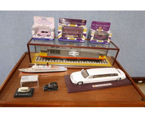 An O scale hand-built class British Railways 58 diesel locomotive on plinth in glass case. The model features two motors, one