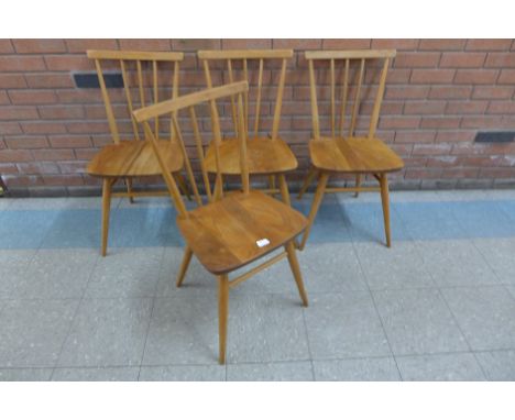 A set of four Ercol elm and beech 391 model chairs 