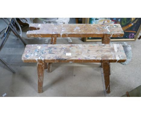 A pair of vintage wood saw benches 