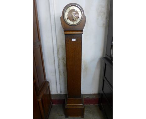 An oak dwarf longcase clock 