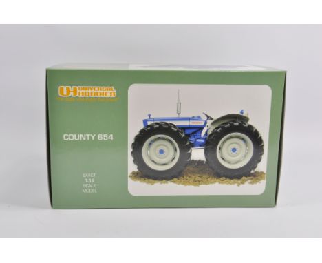 Universal Hobbies 1/16 County 654 Tractor. M in E Box.