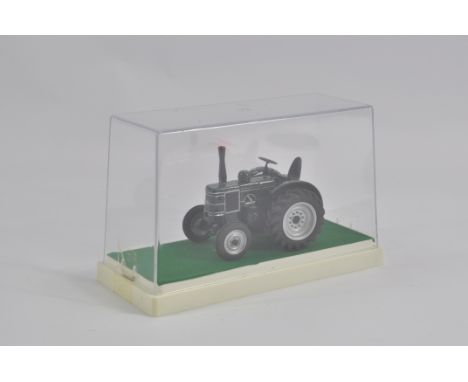 Finely built model in 1/32 scale of a Field Marshall Tractor. NM to M. 