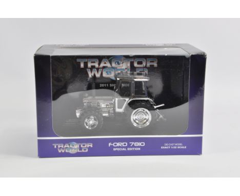 Universal Hobbies 1/32 Ford 7810 Tractor Chrome Limited Edition. M in E Box.