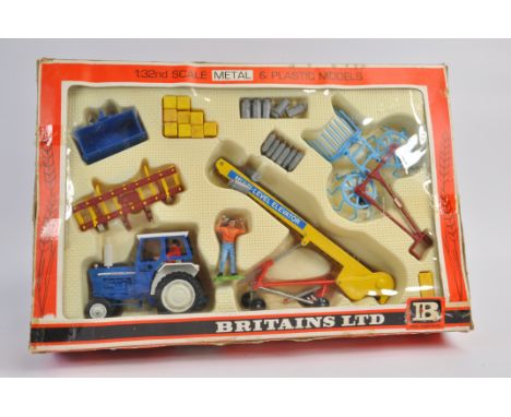 Britains 1/32 Ford 5000 Tractor and Implements Set. VG in F to G Box.