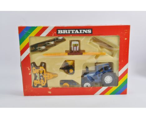 Britains 1/32 Ford 7710 Tractor and Implements Gift Set. VG in G Box.