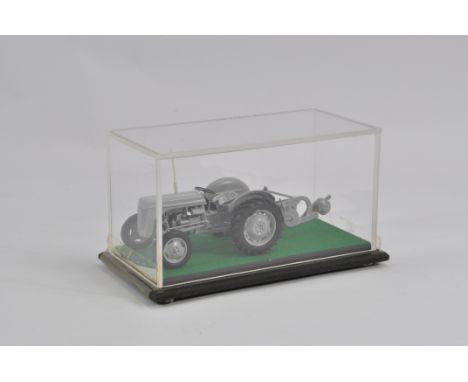 Finely built model in 1/32 scale of a Ferguson TE20 Tractor with Ferguson Plough. NM to M. 