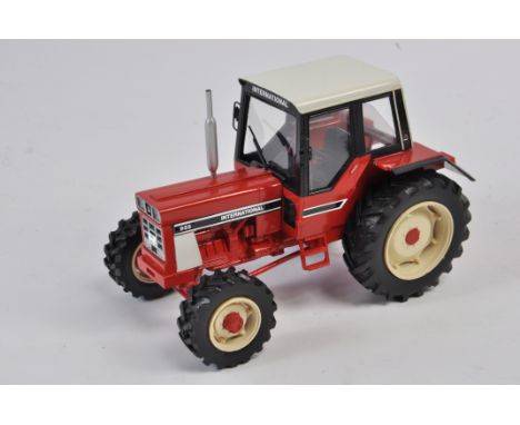 Scarce 1/32 Hand Built International 955 Tractor. Produced as a Modelshop24 Limited Edition. E. 