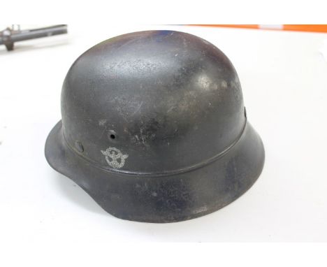 Nazi M35 pattern police helmet with single side decal, stamped under brim - NS64, with tan leather lining