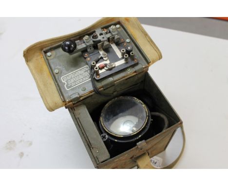 Second World War British Morse Code lamp in box CONDITION REPORT Lamp appears in good original order.  Some missing paint and
