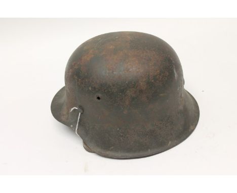 Nazi Wehrmacht M1942 helmet with original tan leather lining and chin strap, interior stamped - K064, 4141, War trophy collec