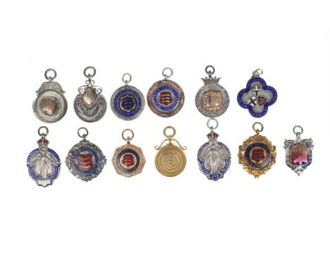 Sporting Award Fobs - Awarded to T. Johnson, during the period 1924 - 1928, to include two Wood Green Hospital Charity Cups, 