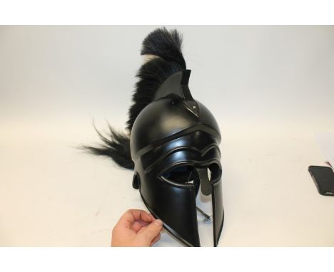 Ancient Greek style helmet of classical form, with black horsehair plume and raised comb - possibly a film prop