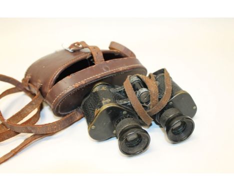Pair of First World War binoculars by W. Watson & Sons Ltd., dated 1918, with broad arrow marks, in leather case