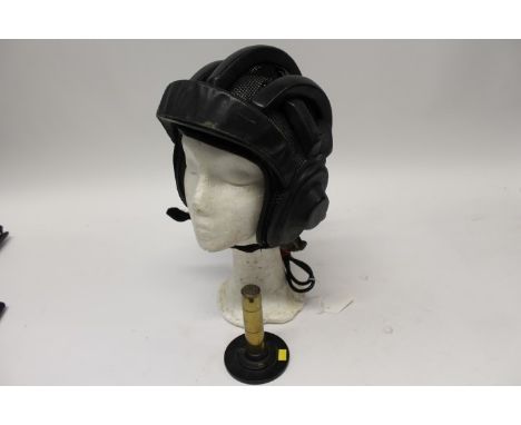Unusual Cold War period, possibly Eastern Block, flying helmet of padded leather and mesh construction, with integral earphon