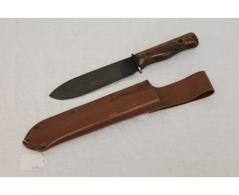 British survival / fighting knife by Wilkinson Sword, with wooden grips, in leatherette scabbard