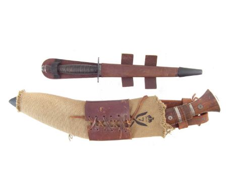 Reproduction Gurka knife and reproduction Fairbairn Sykes dagger, (stuck in scabbard) the largest item measures 43cm long