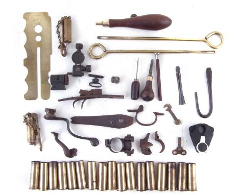 Collection of gun accessories, to include two .303 bore inspection tools, two brass Webley revolver cleaning rods, and nipple