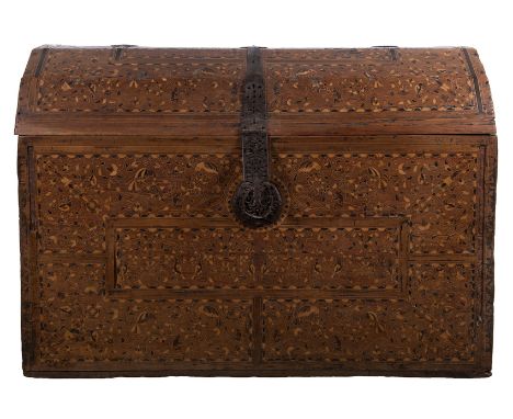 Large Altoperuvian chest, possibly wedding, in carved cedar wood with inlay of various contrasting woods and wrought iron fit