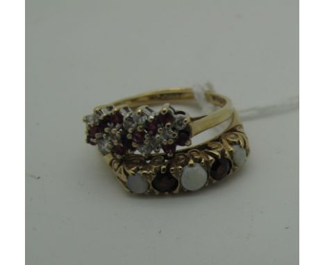 A 9ct Gold Opal and Garnet Five Stone Ring, (one opal chipped) (finger size T); a 9ct Gold Dress Ring, alternately claw set (