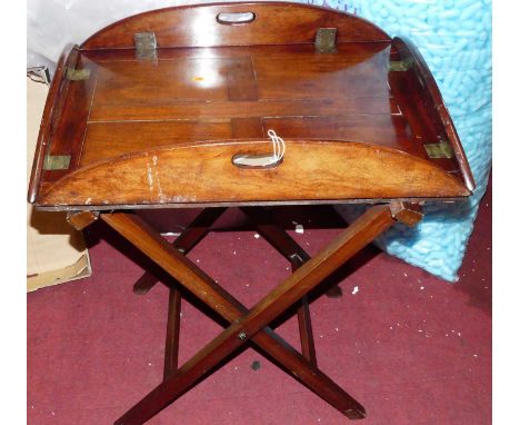 A 19th century mahogany and flush brass inset hinged butler's tray, on X-frame folding stand