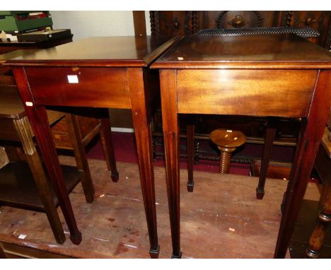 A pair of contemporary mahogany and satinwood rectangular lamp tables, each on square moulded tapering supports to spayed ter