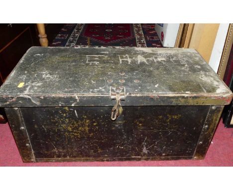 A wooden trunk, having canvas bound lid and iron strap handles, w.68cm 