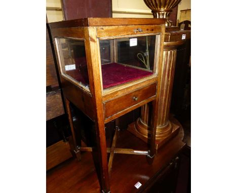 A 19th century mahogany square glazed display cabinet, with hinge top and central drawer, width 32.5cm