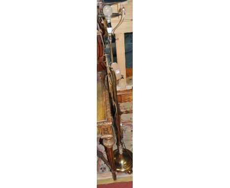 An early 20th century polished brass telescopic standard lamp