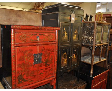 A pair of Chinese red and black lacquered two door bedside cupboards, each having single upper drawers and heightened in gilt