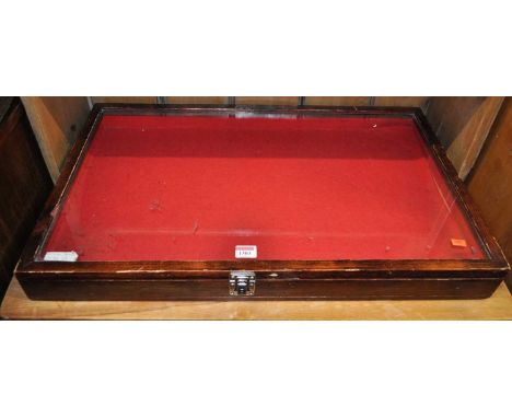 A stained wood and glazed top hinge table-top display cabinet, 43.5 x 71.5cm 