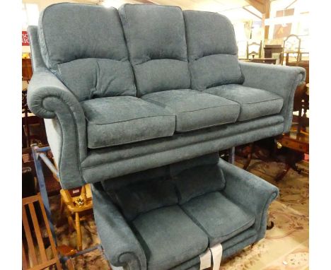 A contemporary blue fabric upholstered two-piece suite, comprising; three-seater sofa and two-seater sofa, having scroll arms