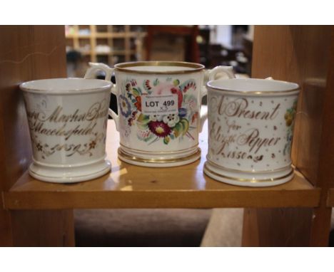 Three 19th century Staffordshire ceramic presentation tankards, hand painted floral decoration, each with gilded inscriptions