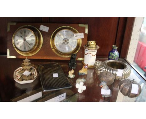 A shelf of collectible items to include wall clock barometer, cigarette case and various figures etc (16)