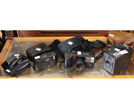 A Kodak Brownie camera with three more modern examples (4)