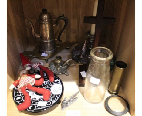 A shelf containing a silver plated chamber stick, silver plated Georgian design coffee pot, etc.