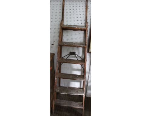A Simplex wooden step ladder, for display purposes only