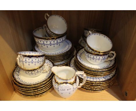 A Royal Crown Derby porcelain tea set, blue design, gilded, comprising twelve of each cups, saucers and tea plates, two servi