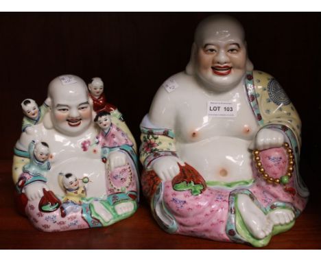 A large ceramic Buddha with a smaller Famille Rose style example (2)
