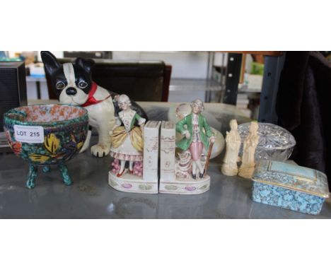 A marble effect bowl containing eggs, a dog doorstop &amp; decorative ceramic items