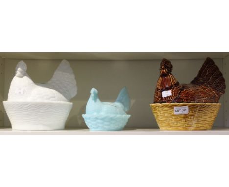 A ceramic chicken egg basket, together with two glass examples