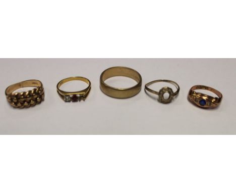 A collection of five gold rings, includes four 9ct, including a plain wedding band and two stone set, together with a stone s