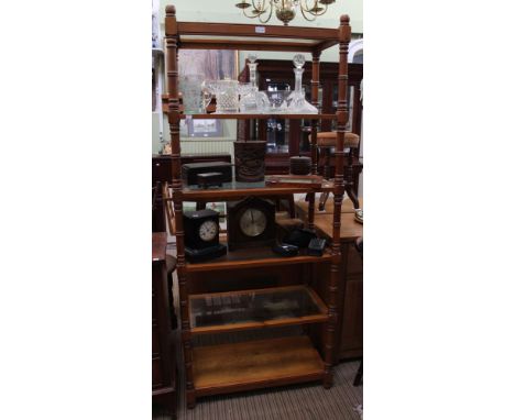 A modern pine six shelf whatnot shelving unit