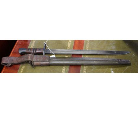 A Remington 1917 American bayonet in scabbard