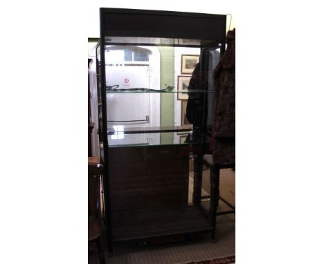 A tall glazed display cabinet with doors to both sides and an interior light