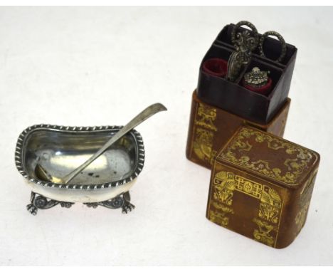 A Regency silver oblong open salt with gadrooned rim, on scroll and paw feet, London 1831 (maker obscured), to/w a salt ladle
