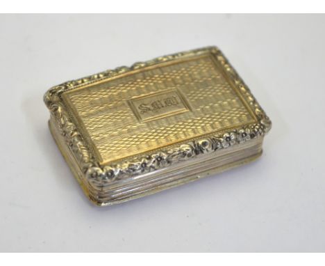 A George IV silver vinaigrette with engine-turned decoration and floral chased rim, gilt interior with foliate pierced grill,