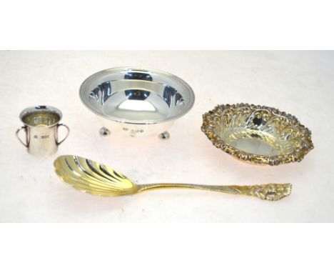 A Victorian silver gilt serving spoon with cast and chased Bacchanalian finial, vine engraved stem and shell bowl, Charles Bo