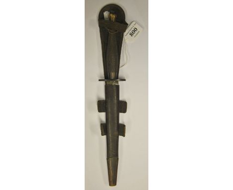A WWII Fairburn Sykes early 2nd pattern commando fighting knife by Wilkinson, the black handle with 2" straight guard and bri